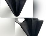 two pictures of a black purse with a gold handle