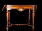 an image of a wooden table with a clock on it