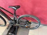a bike that is sitting on the ground in front of a wall