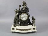 a clock that is sitting on top of a table