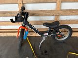 a small bike that is parked in a garage