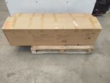 a cardboard box on a pallet in a warehouse