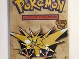 a close up of a bag of pokemon trading cards on a table