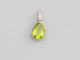 a peridot and diamond pendant