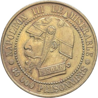 une vieille pièce de monnaie portant l'image d'une tête d'homme