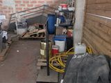 an image of a room with a lot of stuff on the floor