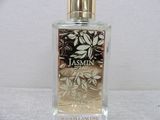 an image of a bottle of perfume on a table