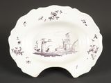 une image représentant une assiette sur laquelle figure un bateau