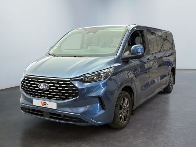 the new 2020 ford transit van is parked in a showroom