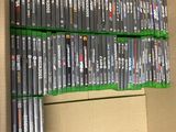a lot of dvds on a shelf in a box