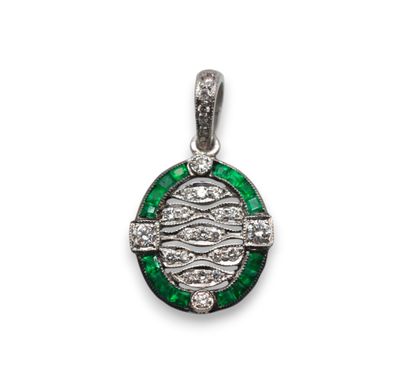 an oval emerald and diamond pendant