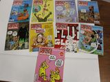 a lot of comic books on the table