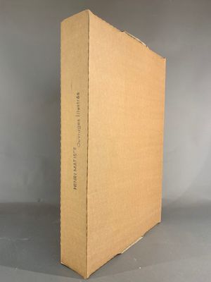 an open cardboard box sitting on top of a gray surface
