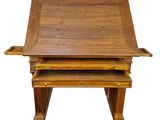 an image of a wooden desk with a drawer underneath it