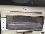 a machine that is sitting inside of a cabinet