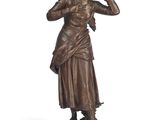 statue of a woman talking on a cell phone on a white background