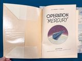 an open book with a picture of a space shuttle on it