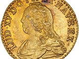 l'image d'une pièce d'or sur laquelle figure une tête de femme