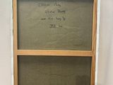 a small easel with a chalk board on top of it