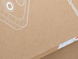 a cardboard box with a picture of a cell phone on top of it