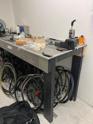 many bikes that are sitting on a table in the room