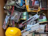 a cardboard box filled with many different types of items