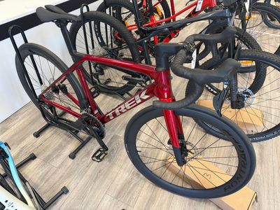 many bikes that are lined up on the floor