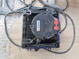 a small electrical device sitting on the floor