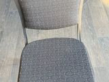 a chair that is sitting on the floor in a room