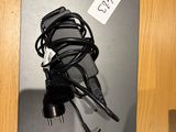 a picture of a laptop and a charger on a table