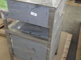 a stack of boxes sitting on a pallet in a warehouse