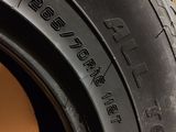 the tire of a car is shown on the side of the wall