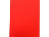 a close up of a red book on a white surface
