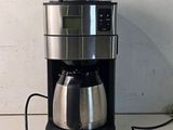 a coffee maker that is sitting on a counter