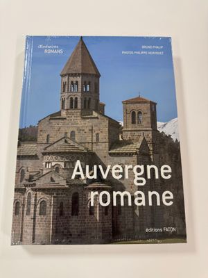 an image of a book with a picture of a church in the background