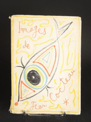 a book with a drawing of a eye on it