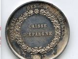 l'image d'une pièce de monnaie ornée d'une couronne, sur un fond blanc