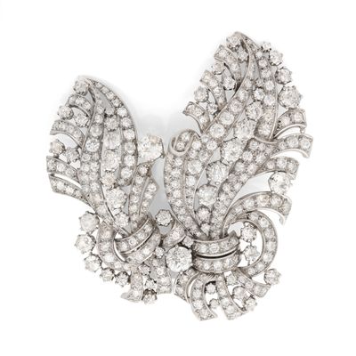 une image représentant une broche en forme de diamant sur fond blanc