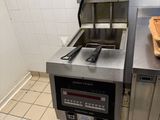 an image of a commercial fryer in a commercial kitchen