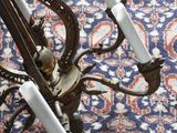 a picture of a chandelier that is on a carpet