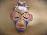 a mask that has a tag on it that says lutto
