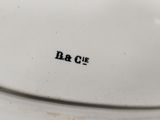 an image of a close up of a plate with the word d r c e written on it