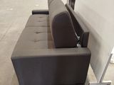 a couch that is sitting in the middle of a room