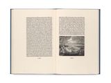 an open book with a black and white image of a boat in the water