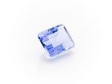 a blue sapphire stone on a white background
