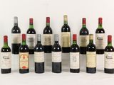 plusieurs bouteilles de vin sont alignées sur une surface blanche