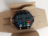 an overhead view of a box with an electrical plug in it
