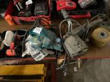 a lot of tools that are sitting on a table