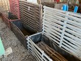a lot of wooden crates that are stacked on top of each other