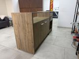 an image of a kitchen with a counter in the middle of the room